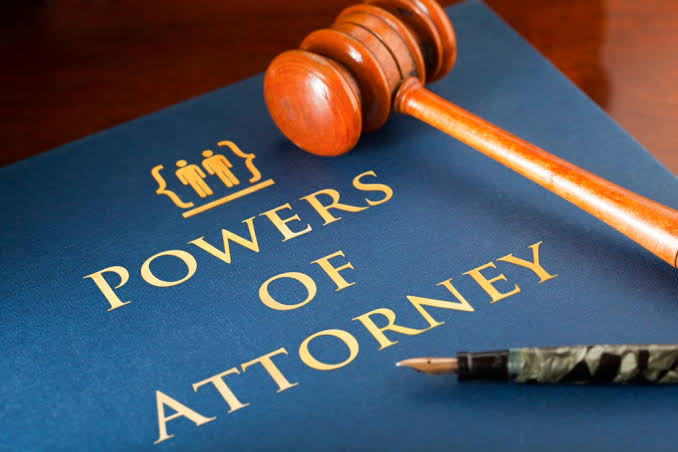 Powers of attorney document with a gavel and pen — powers of attorney in Ontario