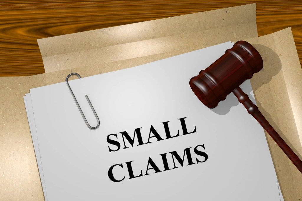 Small claims court papers with a gavel — Small Claims Court in Ontario