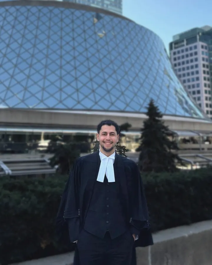 George Habib, lawyer, in barrister robes outside Roy Thomson Hall, Toronto